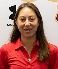 Smiling female student with medium brown hair