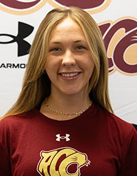 Smiling female student with blond hair