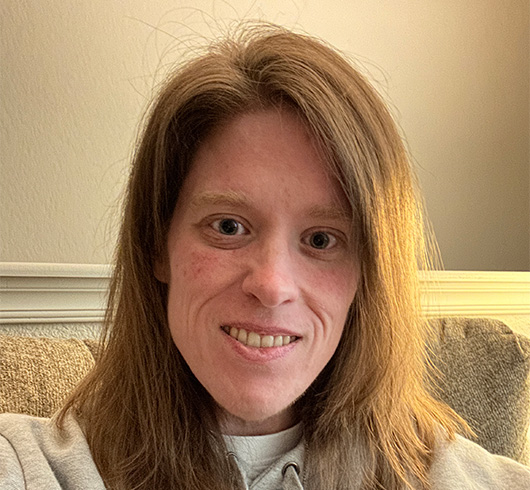 woman with shoulder length light brown hair