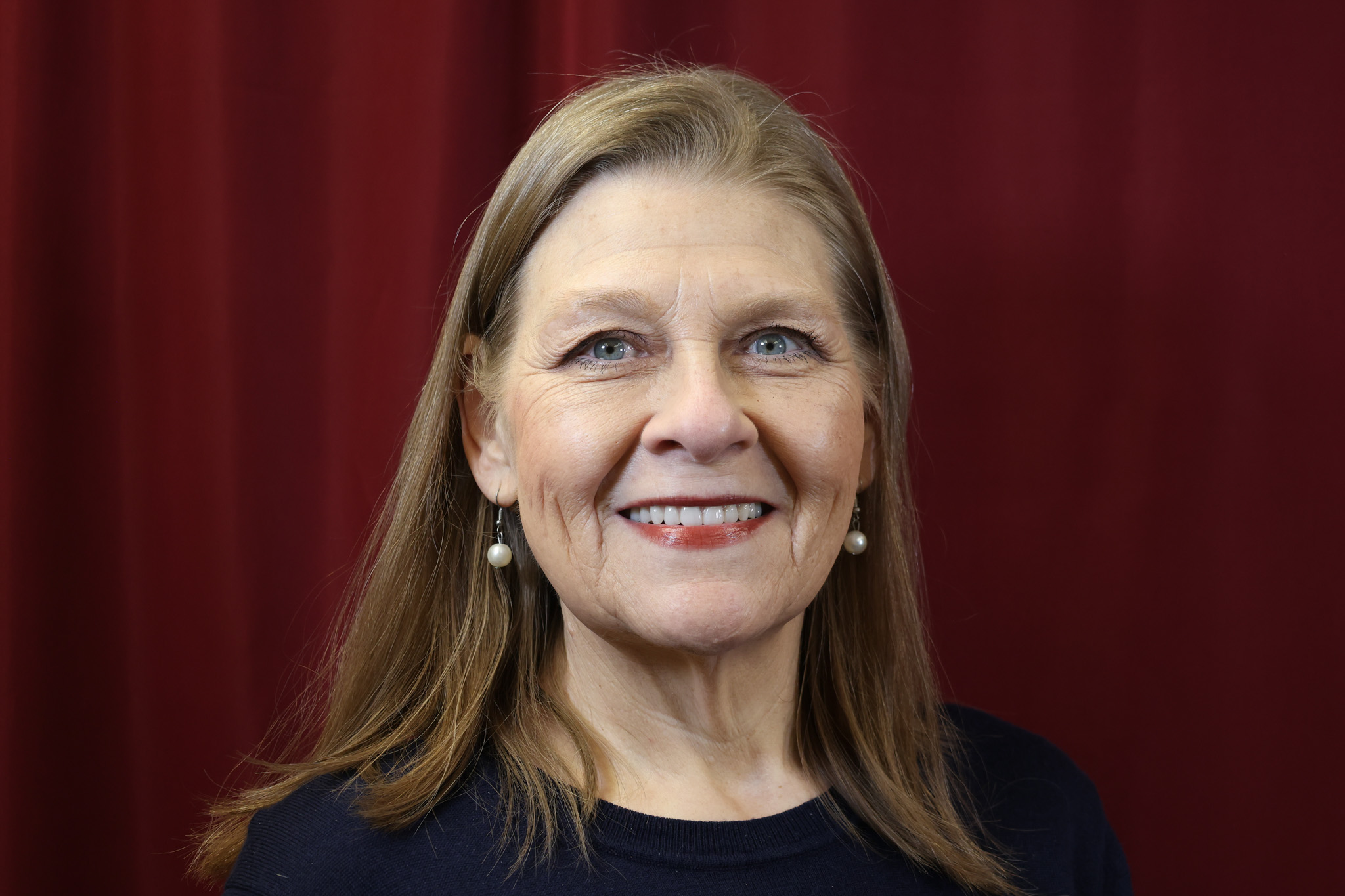 Woman with short blonde hair