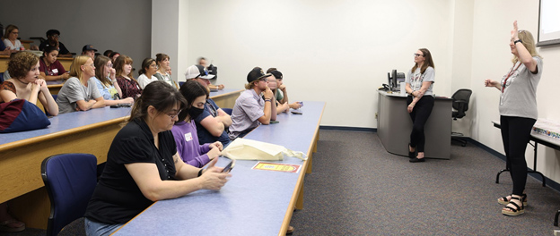 Redlands Community College instructors Elise McCauley and Erin Karl engage students during a college orientation session